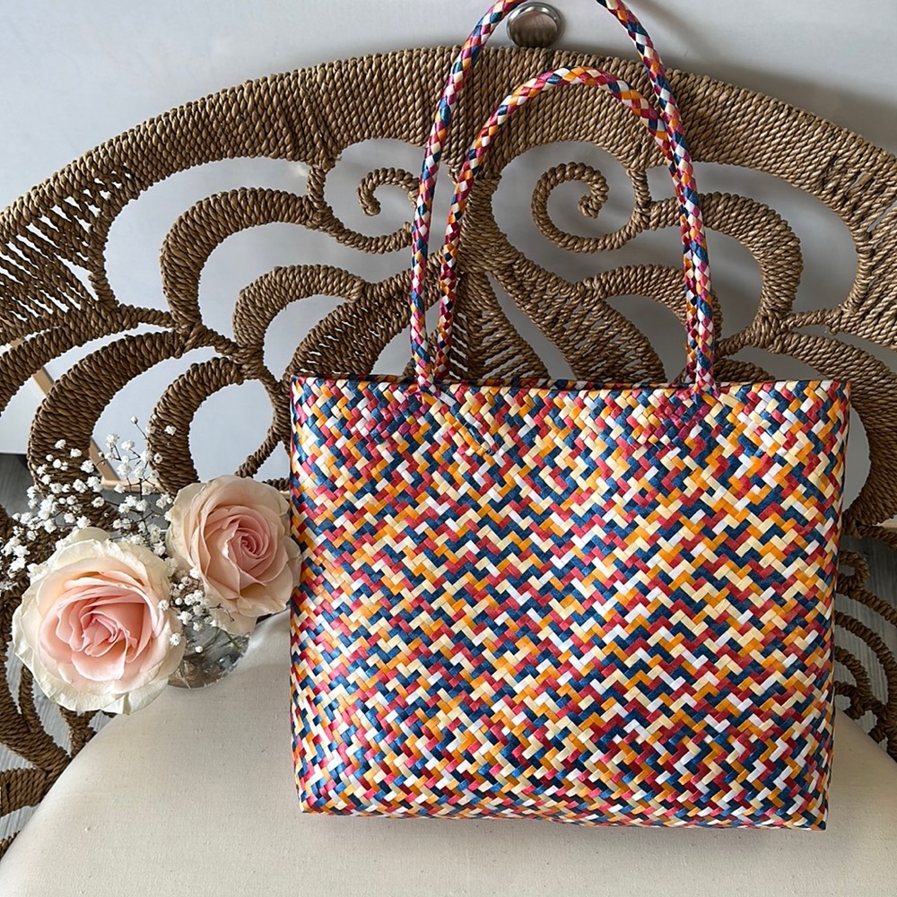 Handmade, multicolor Wolven towed from Pueblo Mexico medium